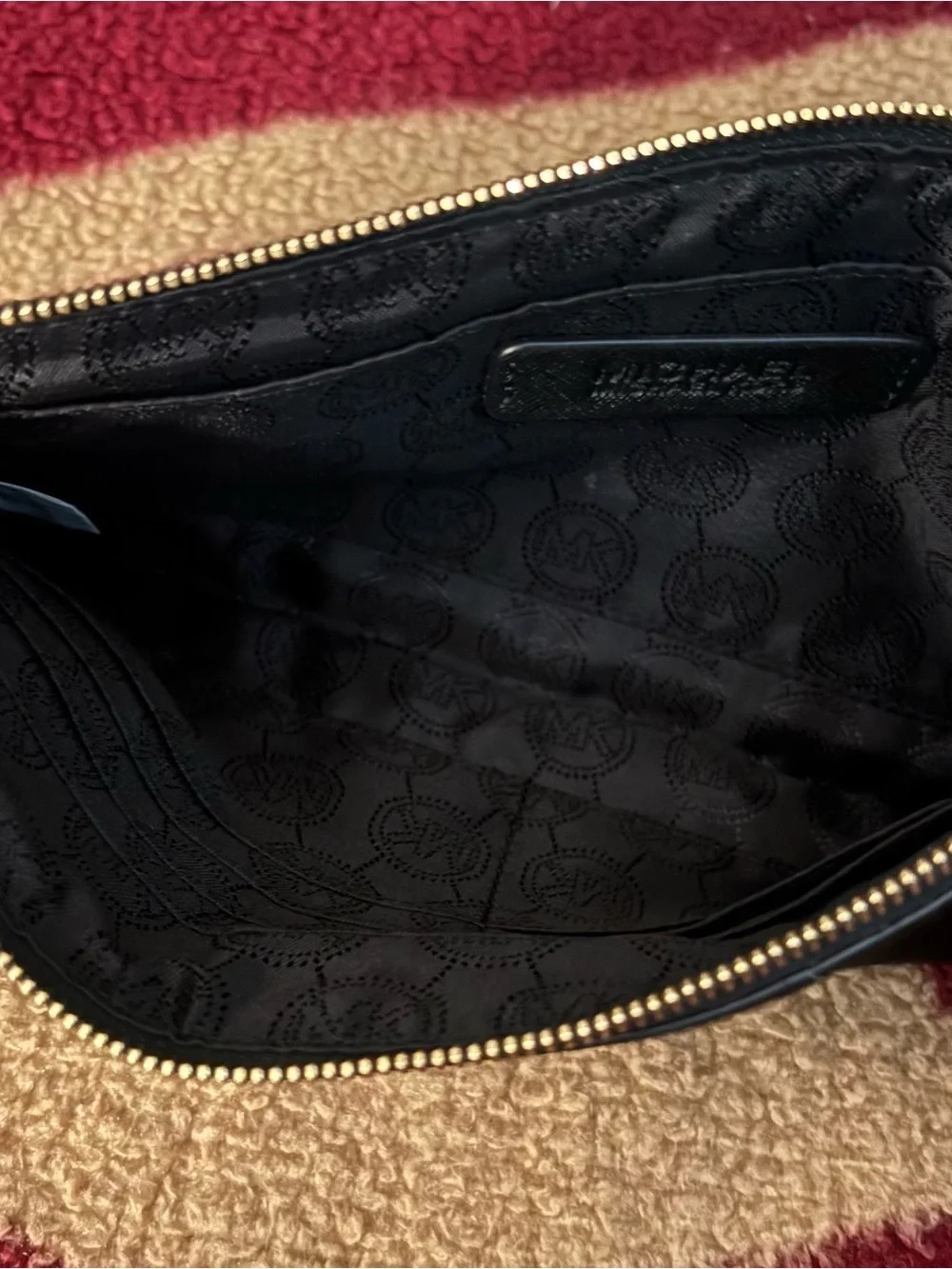 Michael Kors Black Wristlet with Gold Logo